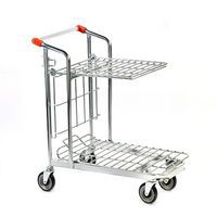 Nesting trolley with foldable shelf.